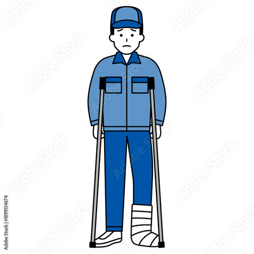 足を怪我して松葉杖をついているつなぎ作業服の男性