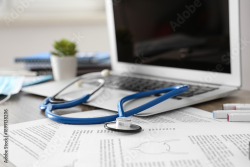 Stethoscope with laptop on ...
