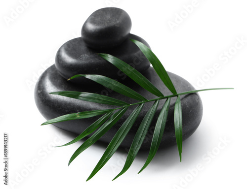 Stack of black spa stones o...