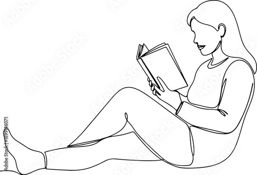 Woman engrossed in reading a book while sitting comfortably on the floor, relaxed, and absorbed in the content
