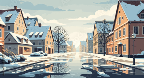 Snowy residential street with orange houses reflecting on wet pavement winter landscape