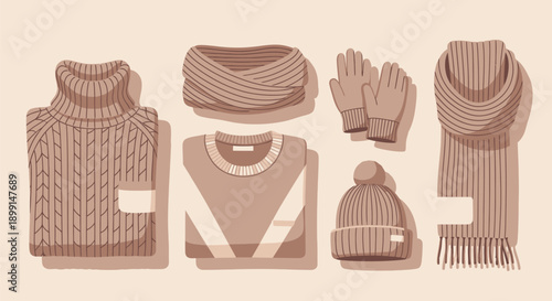 Warm winter clothing set with sweaters scarf gloves and hat on beige background
