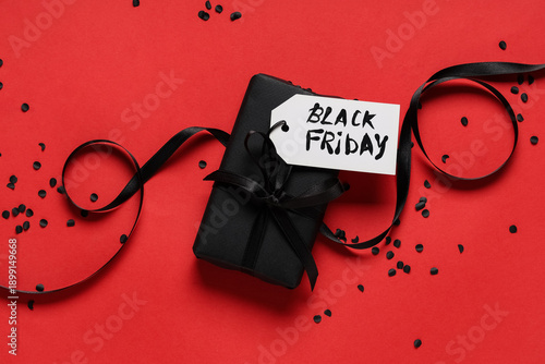Gift box with paper tag and...