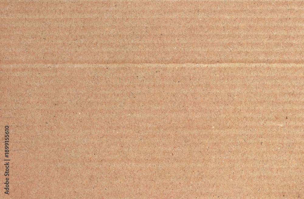 Fototapeta premium Brown cardboard sheet abstract background, texture of recycle paper box in old vintage pattern for design art work.