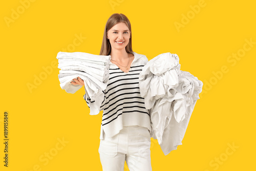 Young woman with white clothes on yellow background