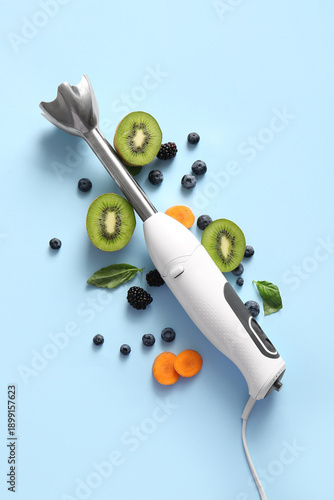 Modern blender with fruits ...