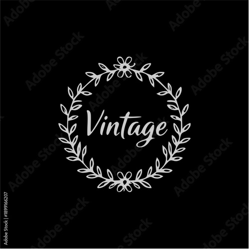 Elegant vintage floral wreath design featuring a classic handwritten 'Vintage' text, perfect for retro-themed branding, wedding invitations, and decorative graphic elements