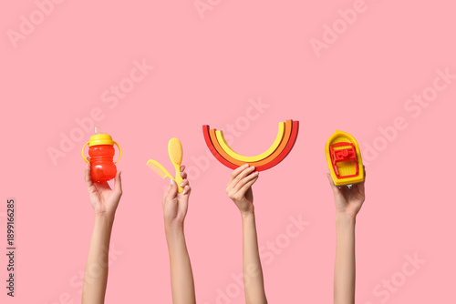 Female hands with baby acce...