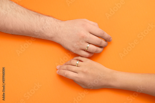 Hands of loving young coupl...