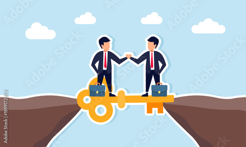 Businessmen shaking hands above a key connecting two cliffs illustrating collaborative agreement and winwin business solution