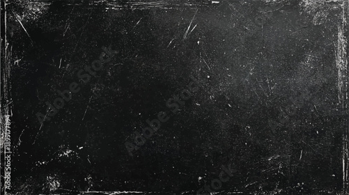 Dark textured background with white scratches and dust particles