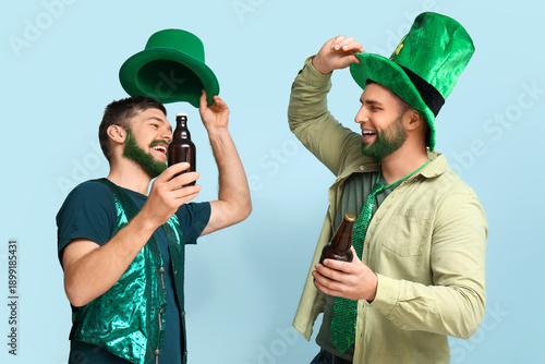 Young men in leprechaun hat...