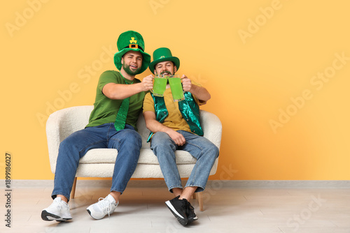 Happy young men in leprecha...