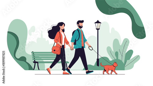 Young couple enjoying a leisure walk together in a city park while taking their pet cat for a stroll on a leash through the trees.