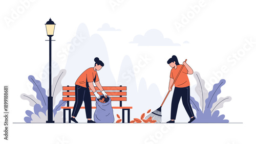 Dedicated volunteers work together in a public park to rake and collect fallen autumn leaves into a bag near a wooden bench and lamp.