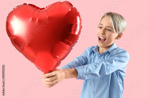 Happy little boy with heart...