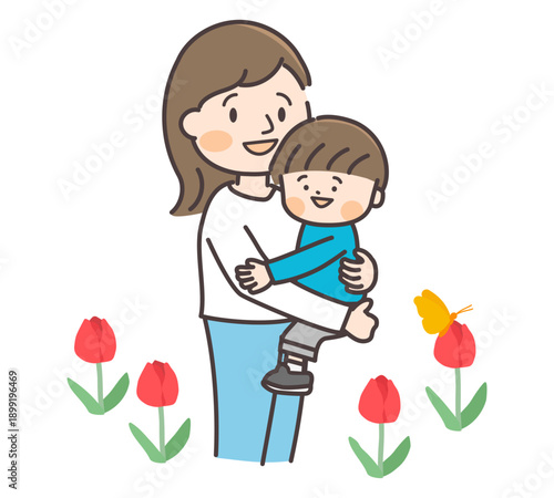 春のチューリップと息子を抱っこする母親