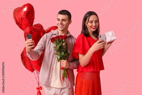 Young couple with mobile ph...