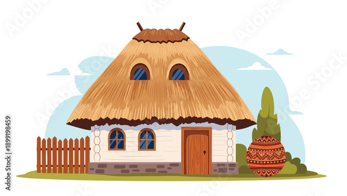 Traditional country cottage house with thatched roof, wooden fence, and decorative Easter egg for village life and holiday themes.