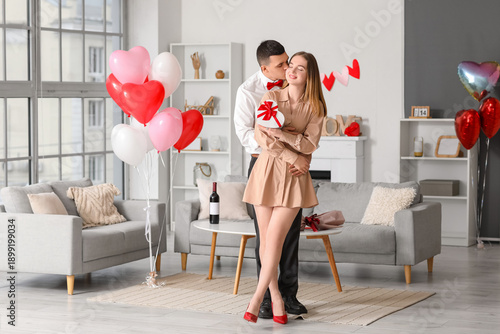 Beautiful young couple with...