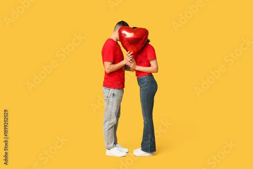 Loving young couple hiding ...