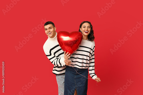 Loving young couple with he...