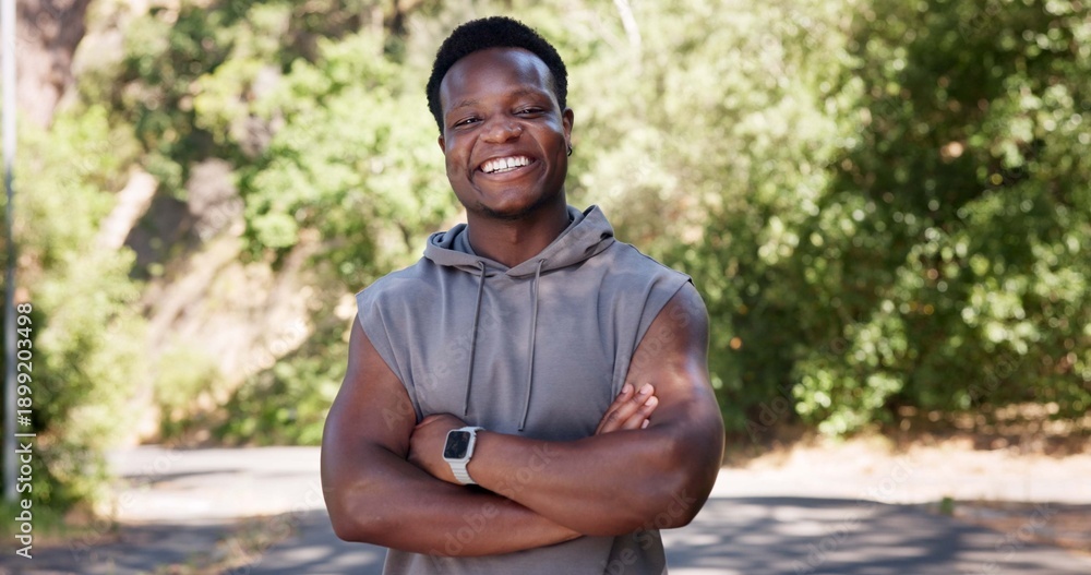 Fototapeta premium Portrait, fitness and black man in street, arms crossed and happiness with exercise. Outdoor, runner and African person with nature, wellness and commitment to training routine and health benefits