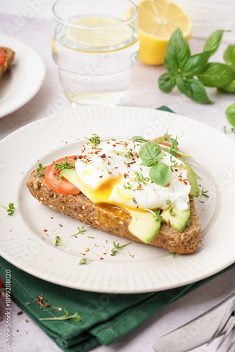 Plate of tasty sandwich wit...
