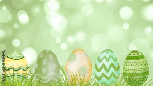 Colorful easter eggs in green grass spring bokeh background