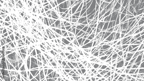 Chaotic white lines intersecting on a textured gray background creating a dense abstract pattern