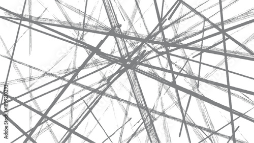 Abstract pattern of intersecting grey brush strokes on a white background texture