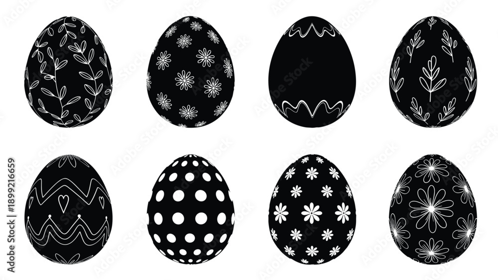 Fototapeta premium Set of eight black Easter eggs decorated with intricate white hand-drawn patterns including florals, polka dots, and zigzags, isolated on a white background.