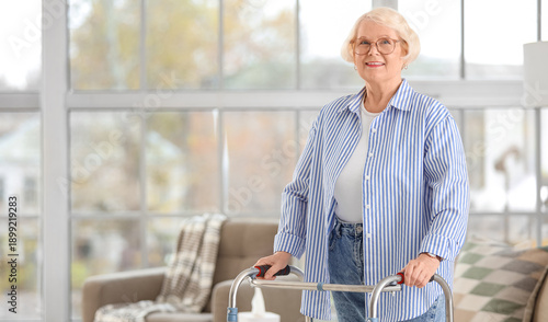 Senior woman with walker in...
