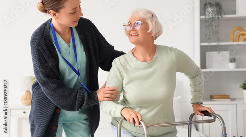 Caregiver helping senior wo...