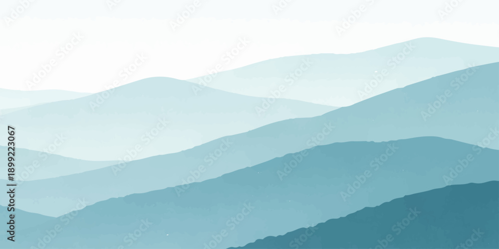 Obraz premium A serene morning mist blankets the blue mountain range as clouds drift over a silhouette of forest hills at sunrise, creating a breathtaking nature landscape view of the valley at dawn