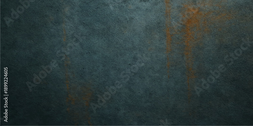 An aged dark blue grunge concrete wall texture with a rough vintage stone pattern and dirty black parchment surface creates a blank antique backdrop design