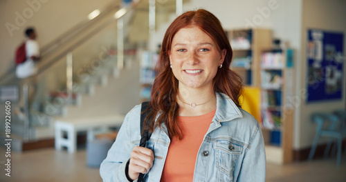 Photos Education, portrait and smile of teen student on high school campus for development or growth