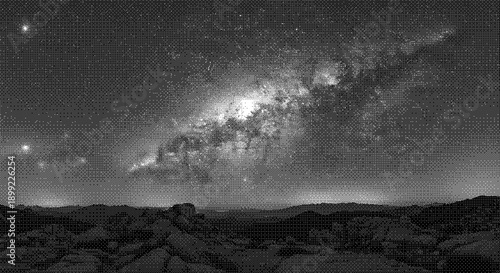 Panoramic View of the Milkyway Galaxy over a Rocky Landscape on a Dark Night