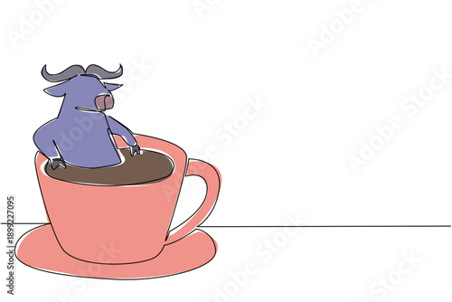 Single line drawing of dark mighty buffalo for nature concept features cute animal soaking in cup of warm coffee. Colorful art represents an international coffee day theme with playful safari mammal