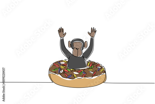 One line drawing of adorable chimpanzee for pastry food concept feature cute animal sitting inside glazed donut. Colorful graphic for kids wall decor purpose with charming dark primate forest creature