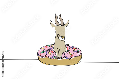 Single line drawing cute safari animal shows playful tan antelope sitting inside sweet donut for pastry food concept. Colorful art is perfect for kids stationery purpose with an adorable savanna fawn