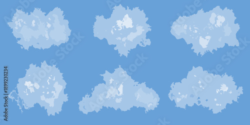 A collection of fluffy white clouds against a clear blue sky background