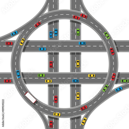 Busy traffic circle interchange with cars, trucks, and roads from above