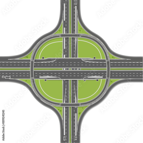 Complex highway interchange with overpasses and green median, top view