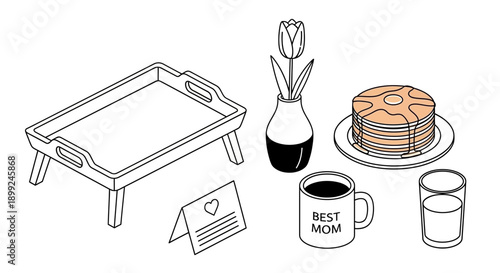 A delightful breakfast in bed spread featuring pancakes, coffee, and a flower, perfect for Mother's Day.