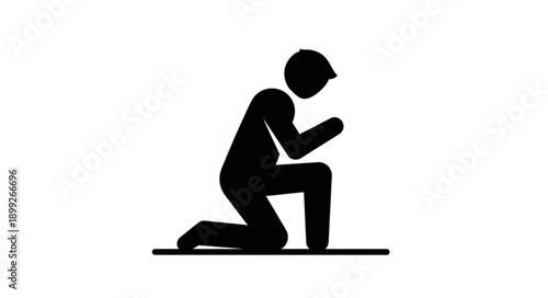 Silhouette of a person kneeling in prayer.