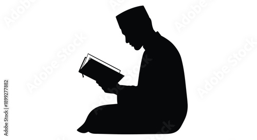 A man reading a book in a kneeling position black silhouette