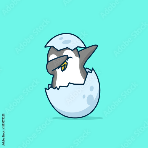 A playful vector illustration of a cute penguin hatching from its eggshell while striking a trendy dabbing pose.