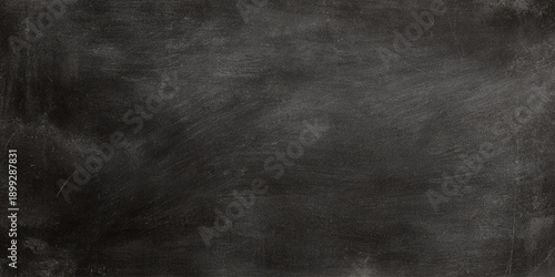 Dark charcoal slate texture background with subtle scratches providing a sophisticated industrial aesthetic.