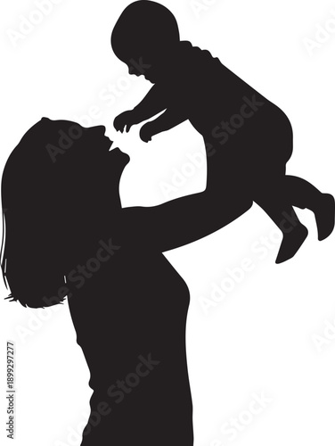 Mother holding baby in silhouette